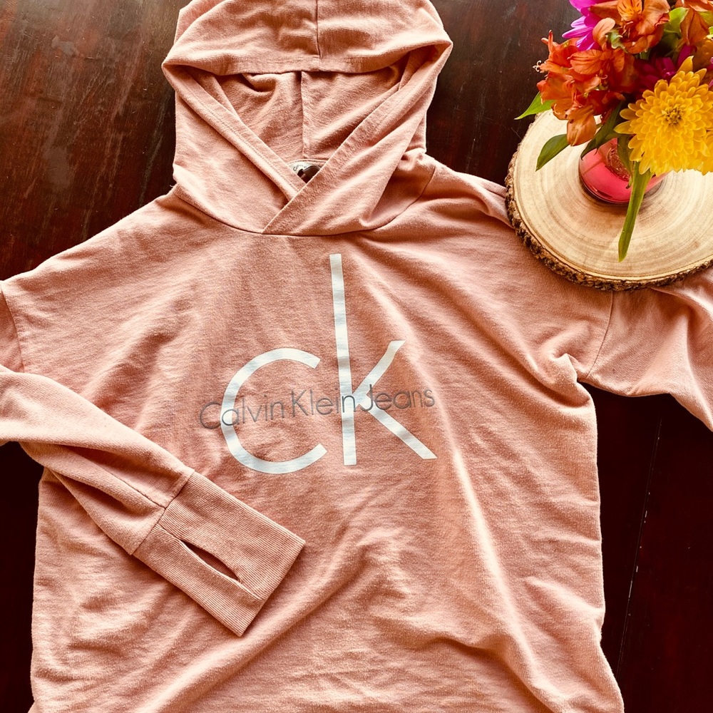 Pink Calvin Klein sweetheart with thumb holes.